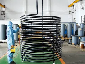 Halar coating for heat coil reactors