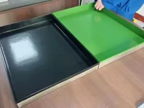Drying trays coated with PTFE to ensure smooth discharge and reduce residue build-up