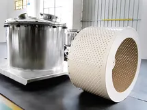 Sanitary-grade centrifuge housing coated with Halar