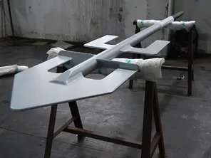 High-solids mixing agitator with external PTFE lining