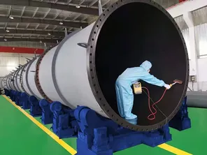 PFA-coated tower for corrosive gas applications