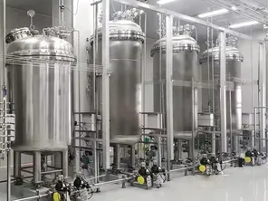 PFA coating for PI polymerization equipment