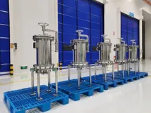 Cartridge filter housings lined with electronic-grade PFA